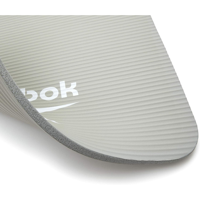 Килимок для фітнесу Reebok, нековзний, натуральна гума, 7/10/15 мм, різні кольори, для тренувань вдома і в залі