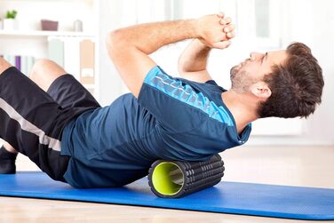 Фасціальна ролика DoYourFitness 34x14 см, середньої жорсткості, для масажу та розслаблення м'язів, піна, масажна фітнес-ролика