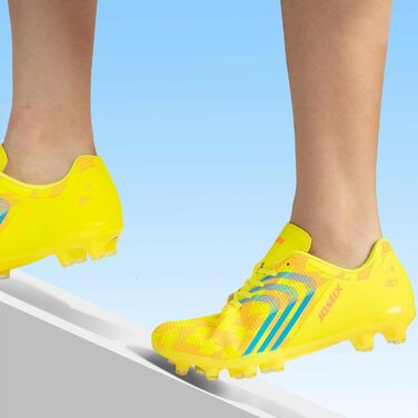 Футбольні бутси JOMIX для чоловіків FG – легкі, неслизькі та зносостійкі з синтетичним верхом, розмір 42 EU, жовті
