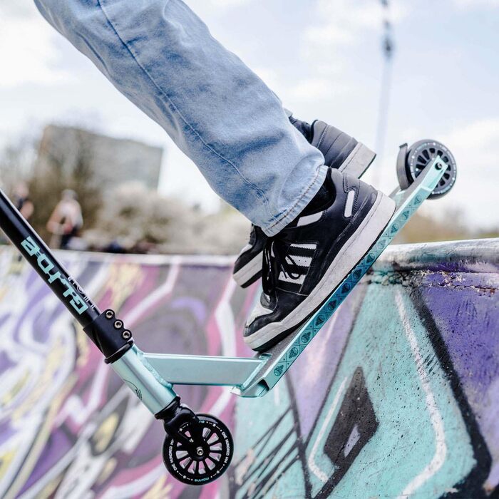 Movino Glide Stunt Scooter: професійний фристайл ролер з колесами 100 мм, дека з алюмінію 6061, вантажопідйомність 100 кг (Glide - блакитний)