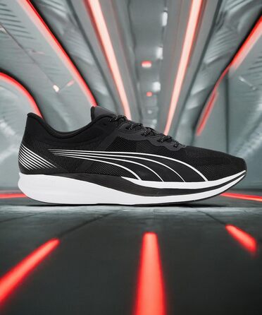 Кросівки футбольні PUMA Unisex Redeem Profoam, 40.5 EU, Puma Black/Puma White