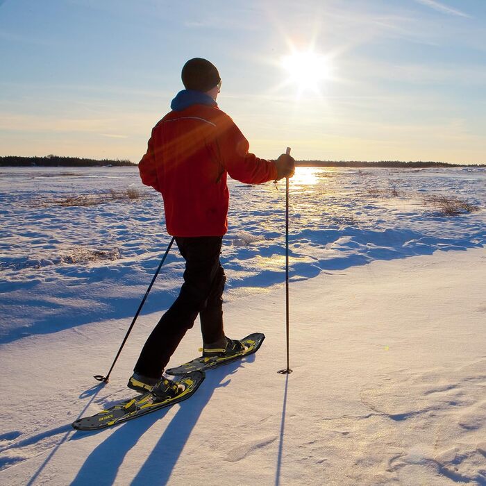 Снігоступи G2 21/25/30 дюймів: легкі, з коробкою для пальців, EVA-підкладкою, підйомкою п'ятки та зручною системою фіксації. Комплект з трекінговими палками, сумкою та захисними бамперами. Доступні кольори: помаранчевий, синій, червоний. Макс. вага користувача: 150 фунтів