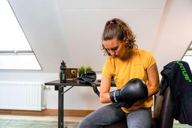 Боксерські рукавички Tunturi Allround 10oz для тренувань на мішку, різних єдиноборств і спарингу, жорсткий PU, чорні/білі