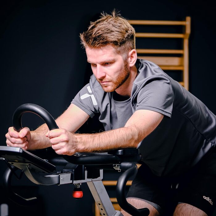 Велотренажер SportPlus Speedracer для дому, студійна якість, 50 рівнів опору, триатлонний руль, гоночне сідло, потужність до 500 Вт, вага користувача до 150 кг